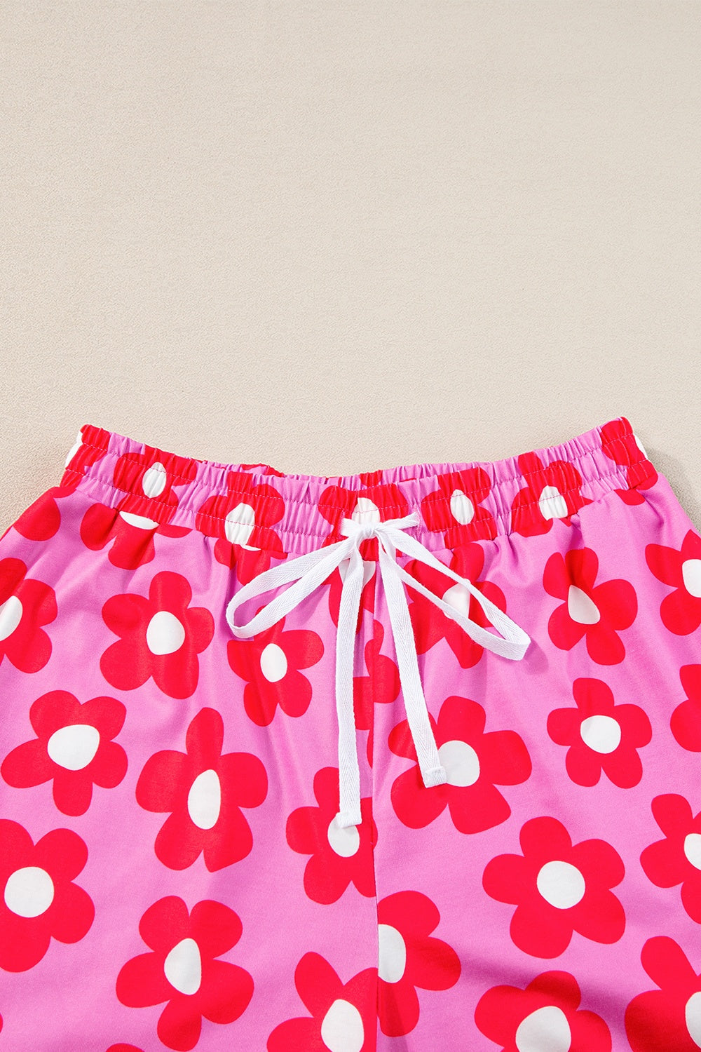 Pocketed Flower Half Sleeve Top and Shorts Lounge Set by SYNZ