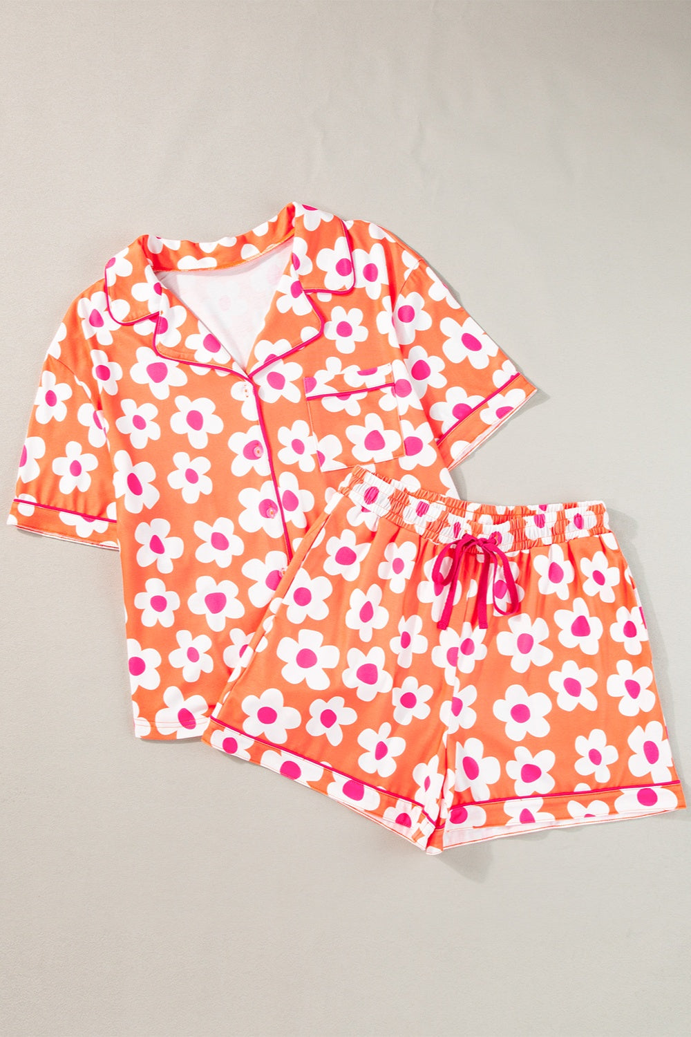 Pocketed Flower Half Sleeve Top and Shorts Lounge Set by SYNZ